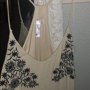 Francesca’s tan dress